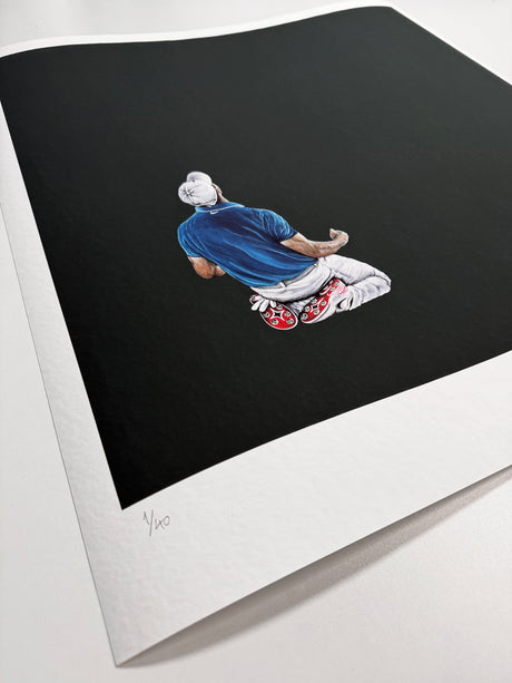 McIlroy's Masterpiece print by AJ Laird showing Rory McIlroy kneeling in celebration on a black background